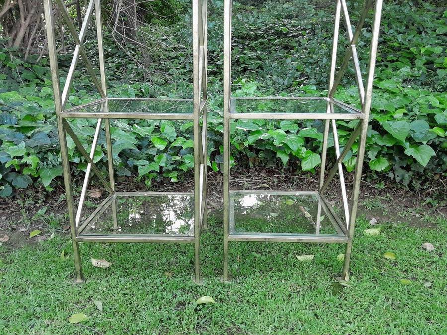 A Pair Of Wrought Iron And Gilded Display Stands With Bevelled Glass Shelves Custom-Made For The ...
