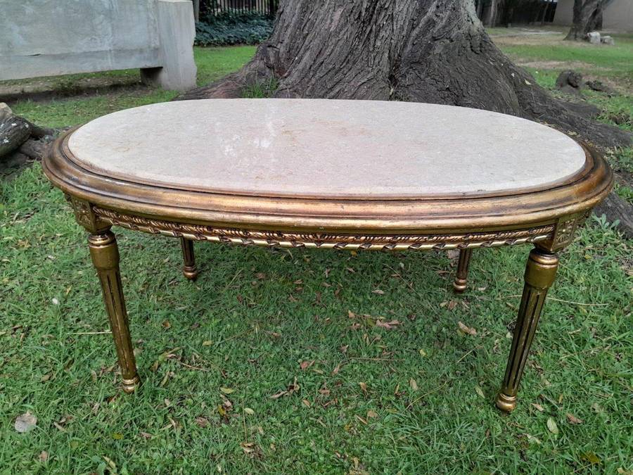 A French Style Oval Carved Giltwood Coffee Table With A Marble Top