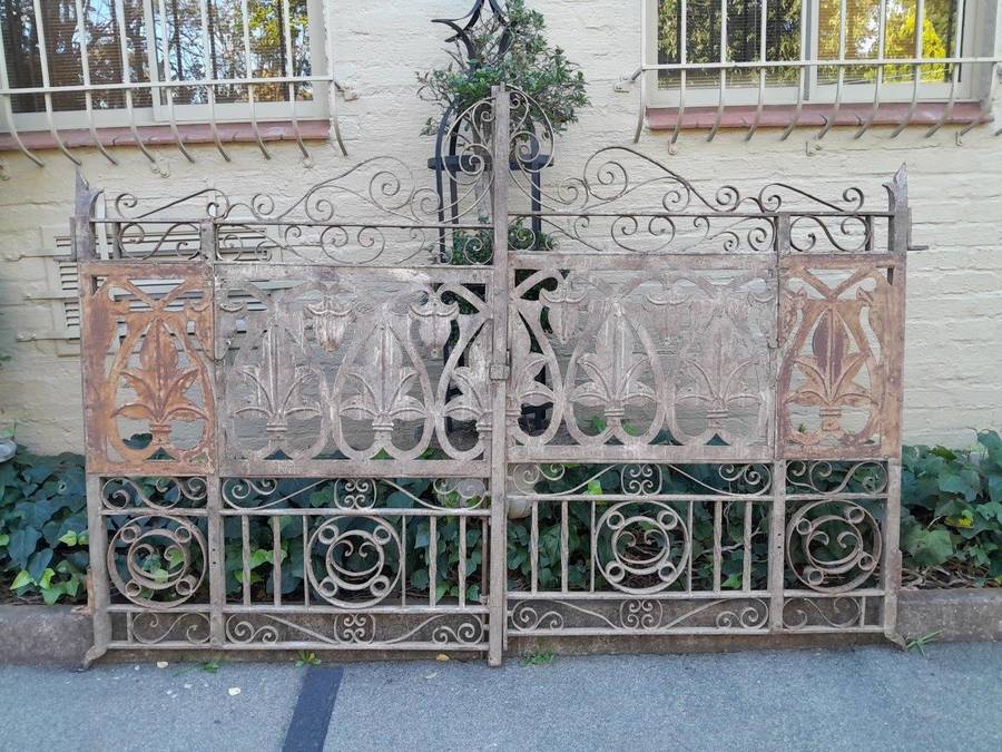 A 20TH Century Pair Of Heavy Hand-Made Wrought Iron Gates