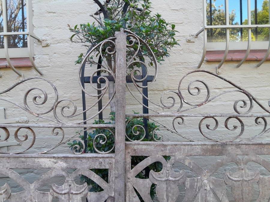 A 20TH Century Pair Of Heavy Hand-Made Wrought Iron Gates