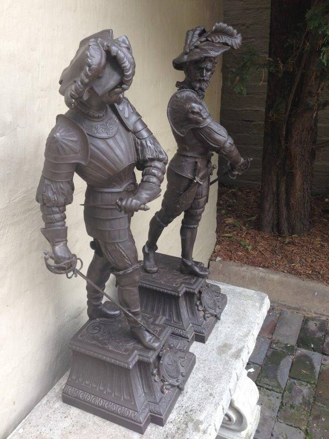 A pair of late 19th Century / Early 20th Century spelter Cavalier Figures