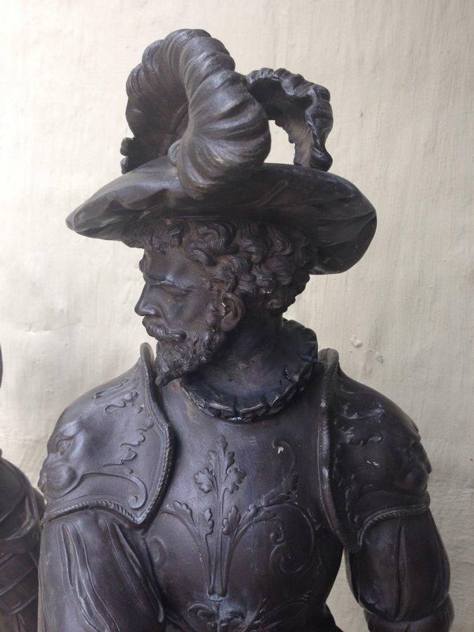 A pair of late 19th Century / Early 20th Century spelter Cavalier Figures