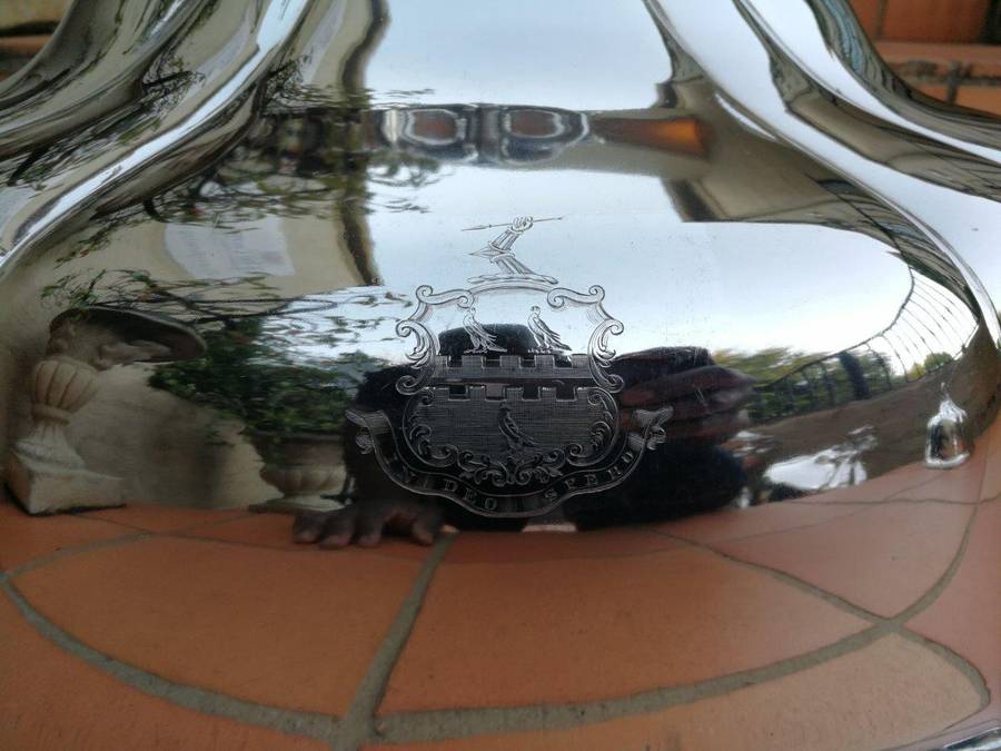 A Set Of Four Silver-Plate Food Domes