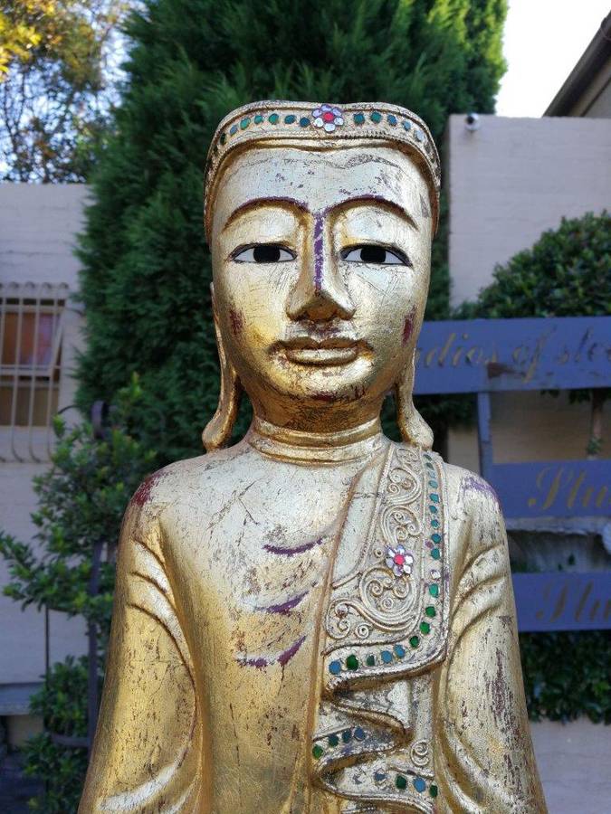 A Large Decorative Carved Gilded Statue On A Custom-Made Perspex Base ND