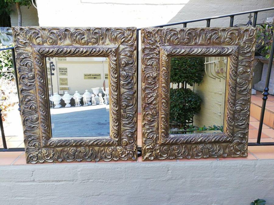 A Pair Of  20th Century Bevelled And Gilt-Painted Wooden Mirrors