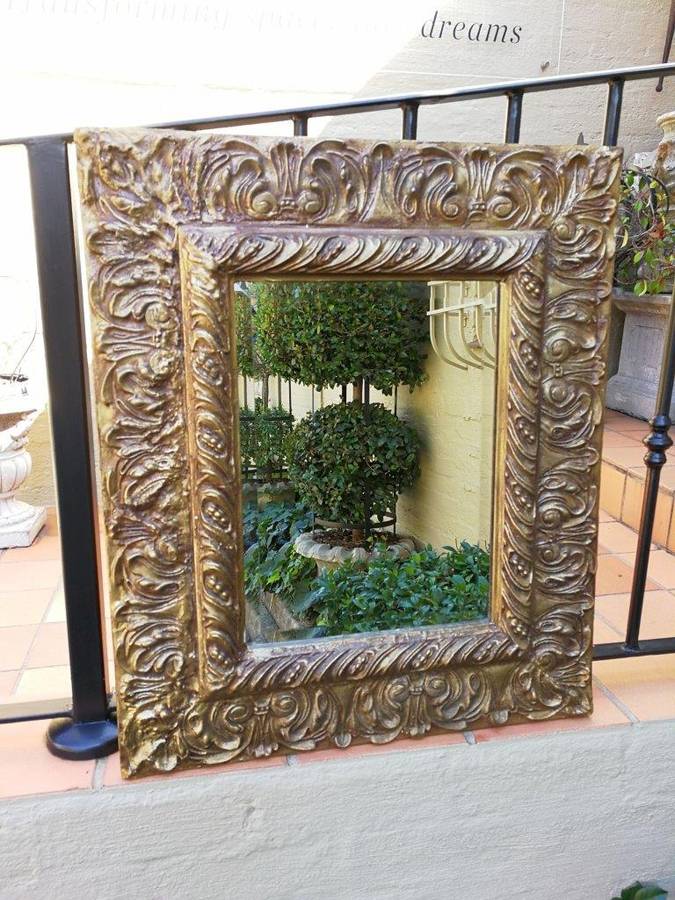 A Pair Of  20th Century Bevelled And Gilt-Painted Wooden Mirrors