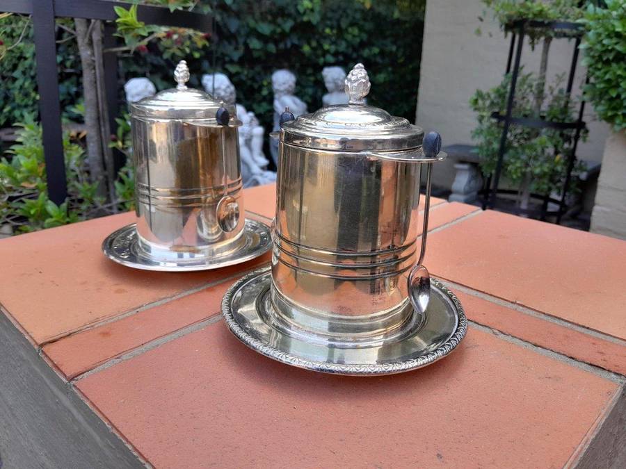 A Rare Pair of Silver Plate Tea Caddies (Regular and Decaf Tea)  each with Two Teaspoons with Re...