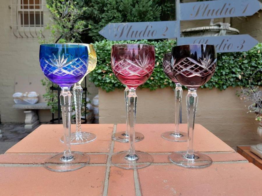 A Set of Six Crystal Harlequin Crystal Glasses in Various Colours