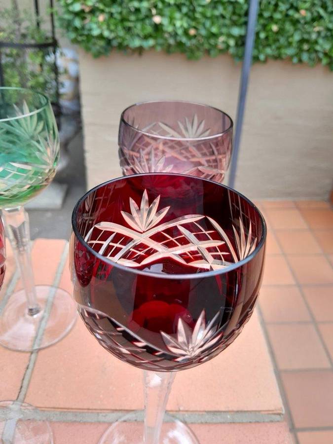 A Set of Six Crystal Harlequin Crystal Glasses in Various Colours