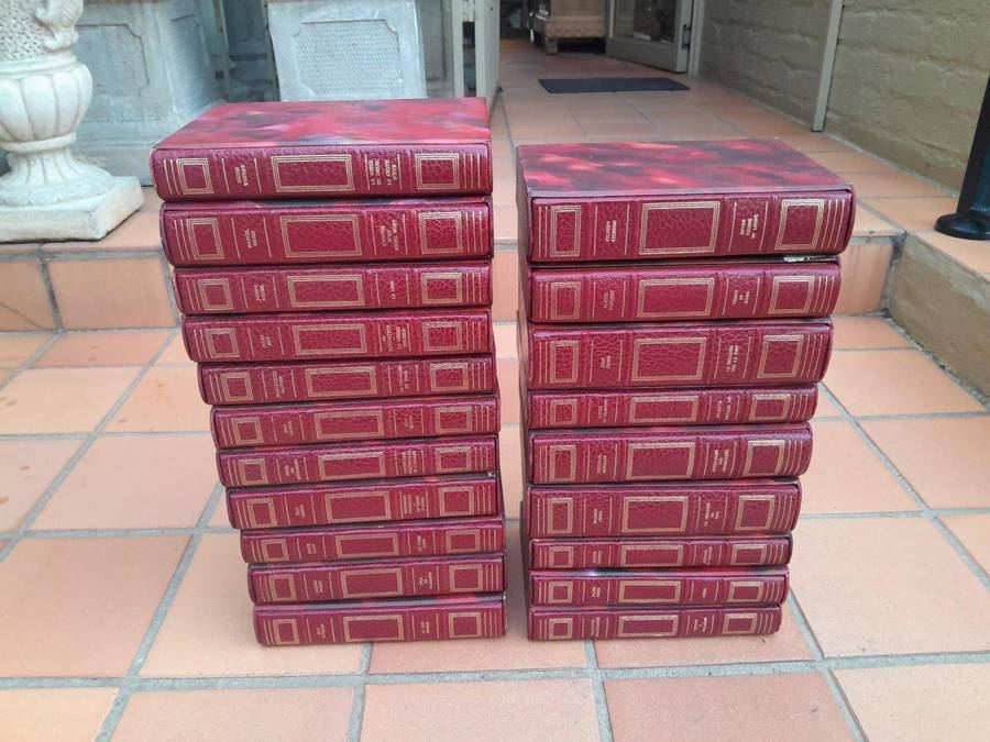 A 20th Century Collection Of Twenty French Books In Red Leather And Gilded (In Protective Sleeves)
