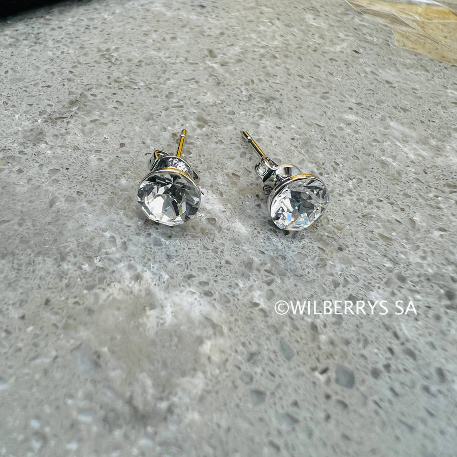 Retail: R1950.00 BRITISH JEWELLERS Solo White gold plated Earrings Made with Swarovski Elements®