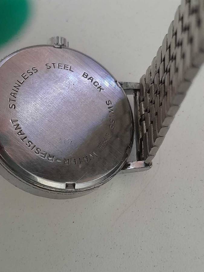 Rotary wind up watch