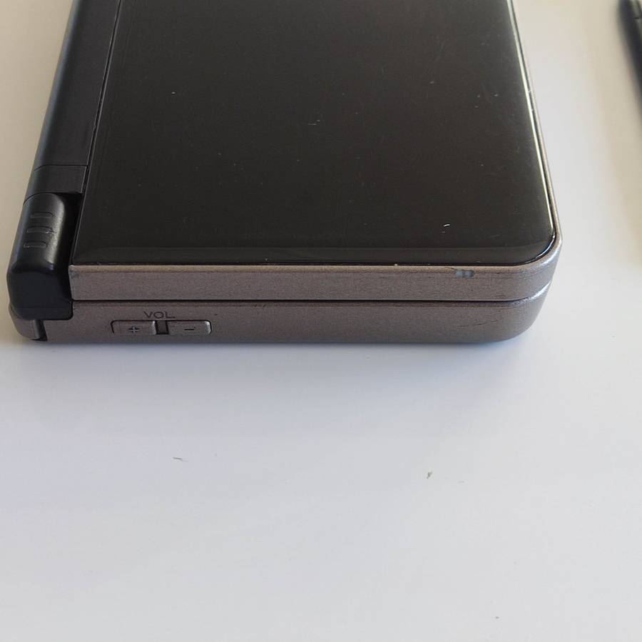 Nintendo Dsi Xl console with original charger
