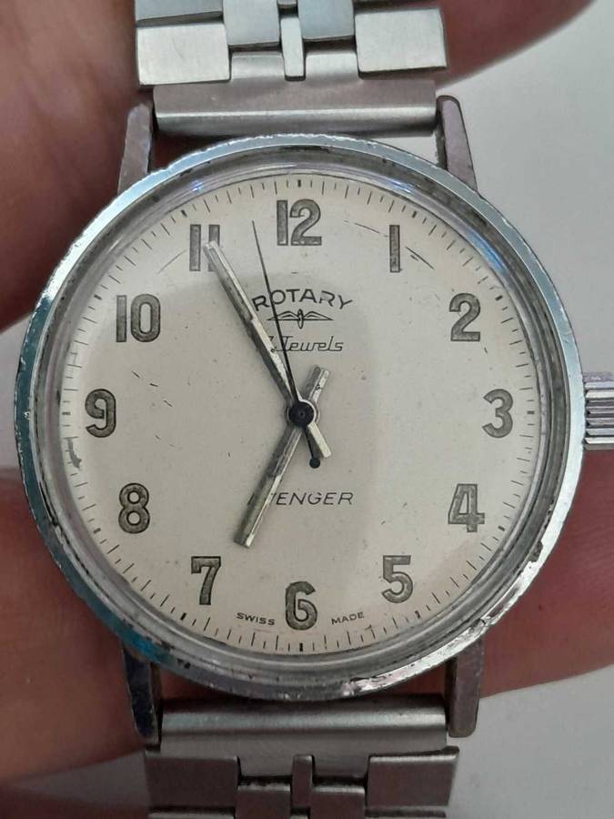 Rotary wind up watch