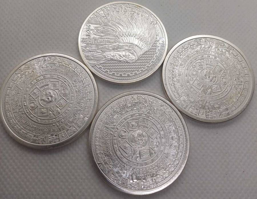 4x1oz Silver Coins as per picture