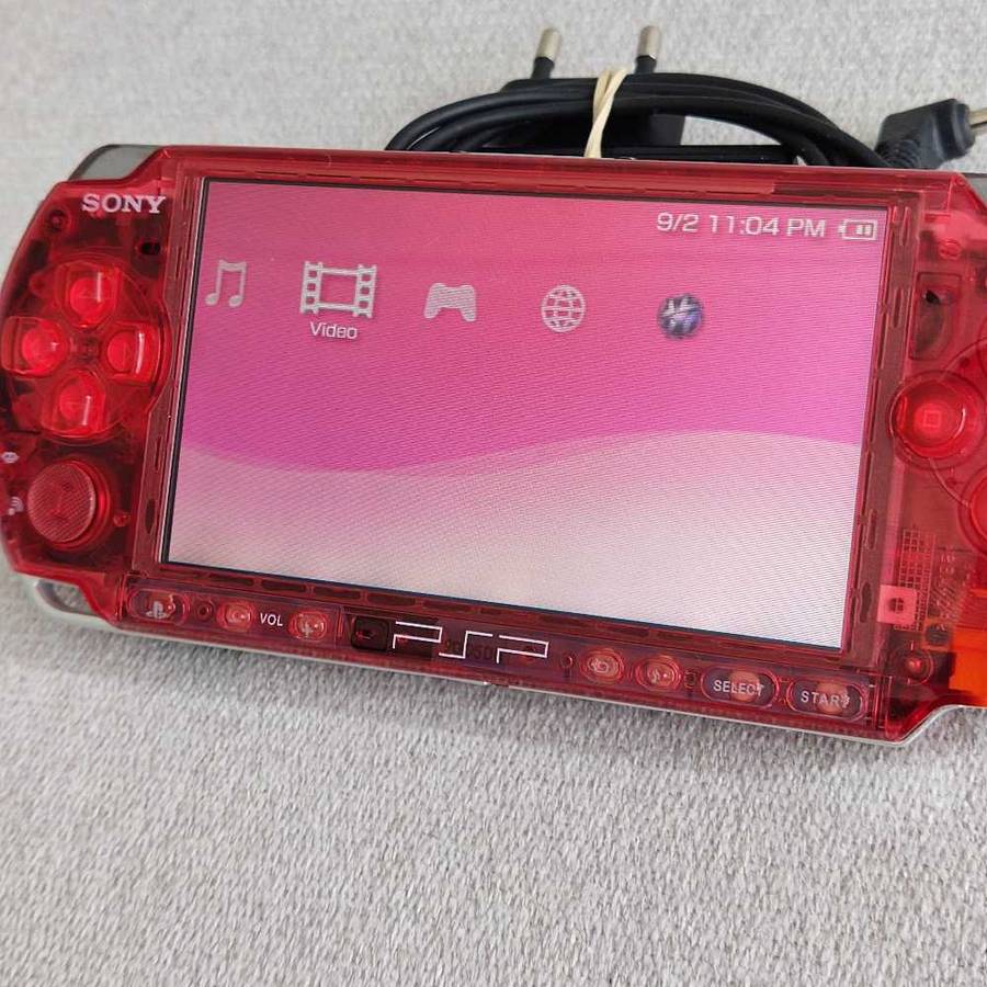 Sony psp console with memory card and charger