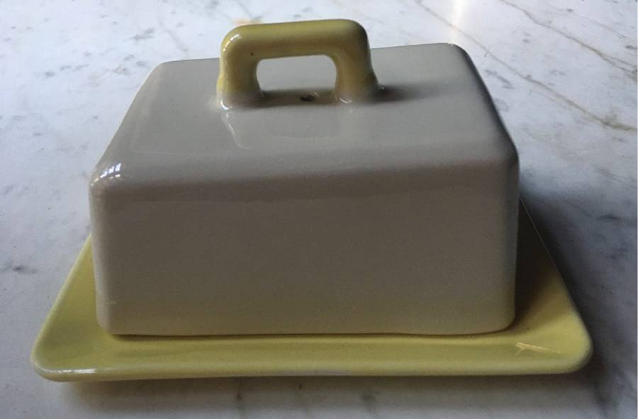 Art Deco ceramic butter dish with yellow base
