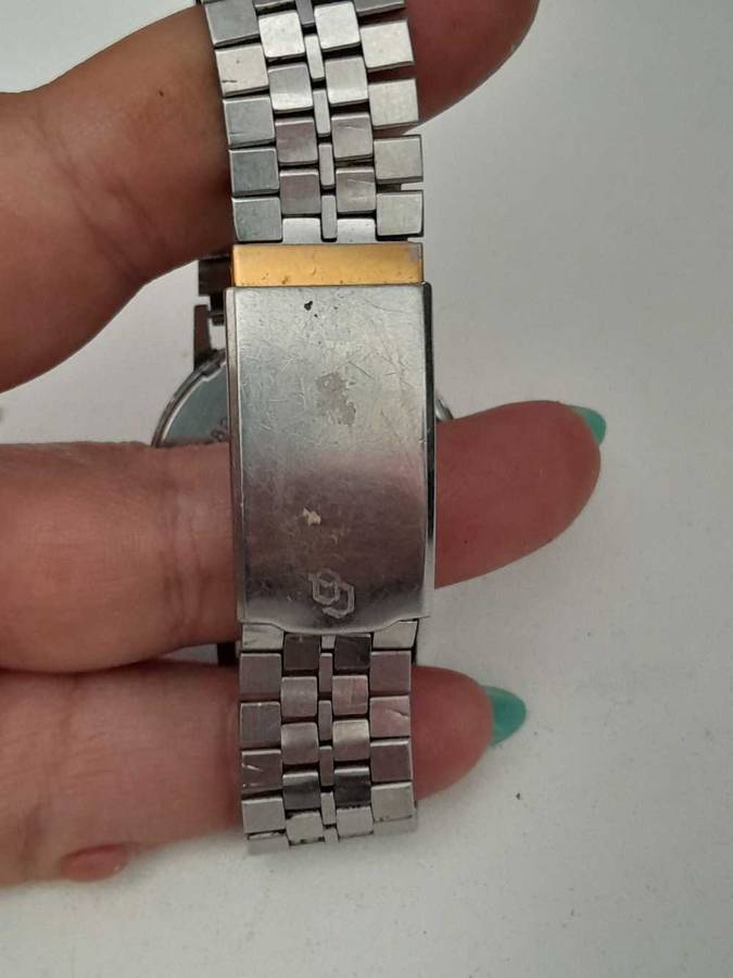 Rotary wind up watch