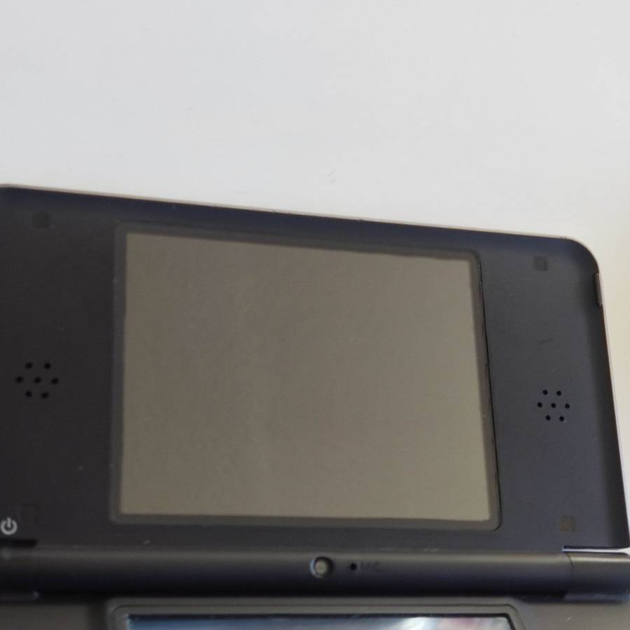 Nintendo Dsi Xl console with original charger