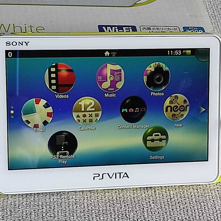 PS Vita / Playstation Vita Slim Model 2000 - Lime Green/White console