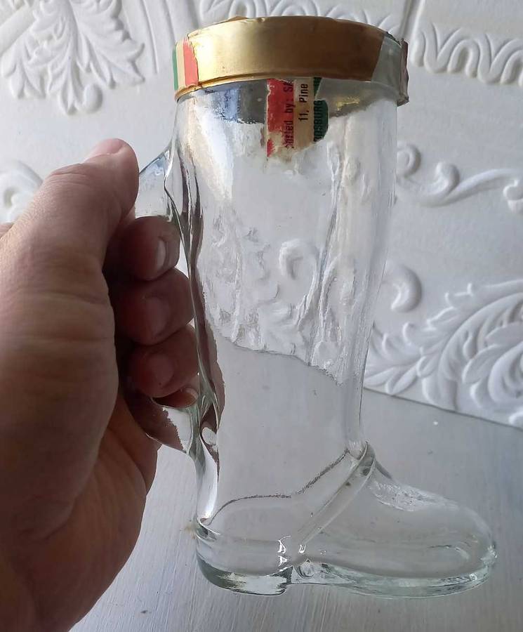 Glass bottle/holder shaped as a shoe/boot