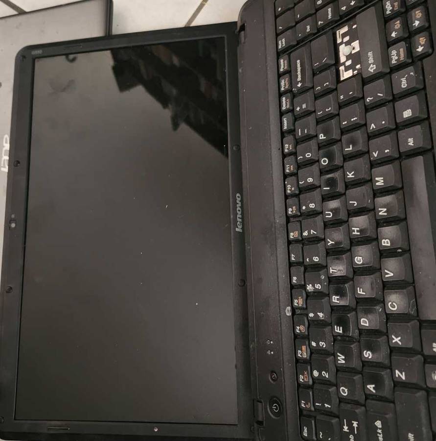 Two laptops for spares or to fix and a free cd writer also not working