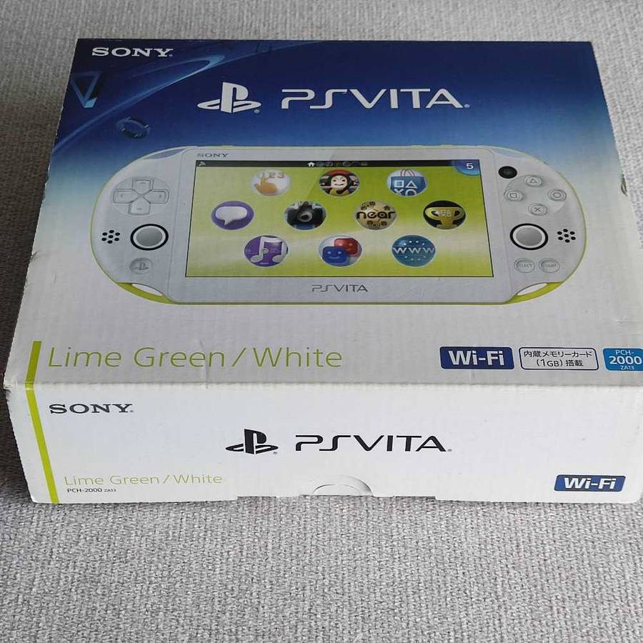 PS Vita / Playstation Vita Slim Model 2000 - Lime Green/White console