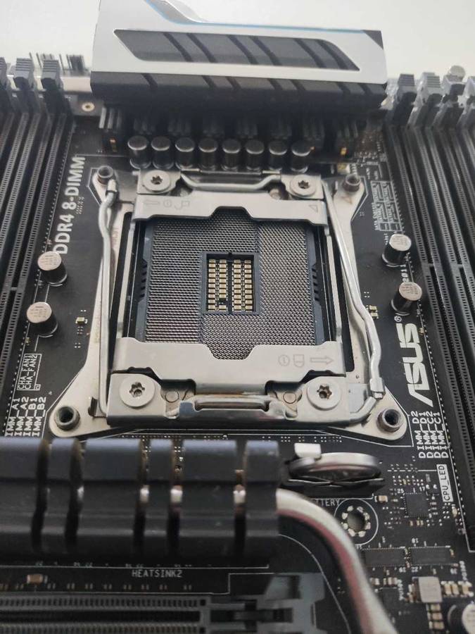 Asus X99 Deluxe Motherboard**Please read**Sold for parts or repair**