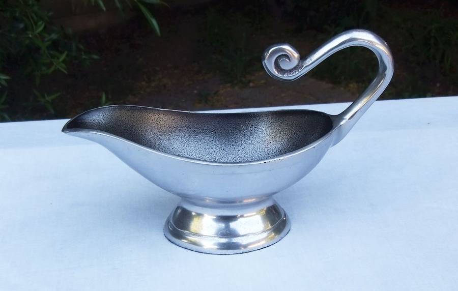 A STUNNING CARROL BOYES STYLE METAL SAUCE OR GRAVY BOAT
