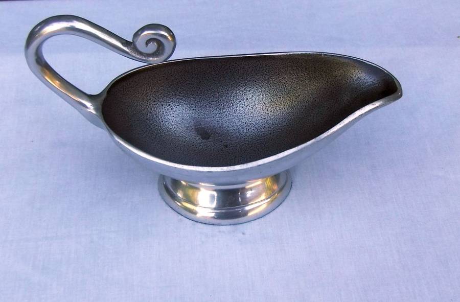 A STUNNING CARROL BOYES STYLE METAL SAUCE OR GRAVY BOAT
