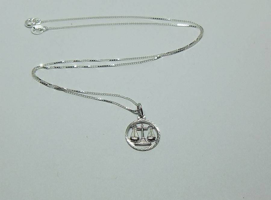 A vintage German 835 silver Libra Zodiac sign pendant with a sterling silver necklace