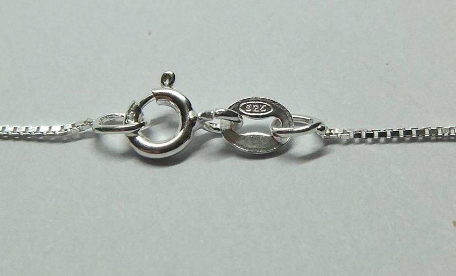 A vintage German 835 silver Libra Zodiac sign pendant with a sterling silver necklace