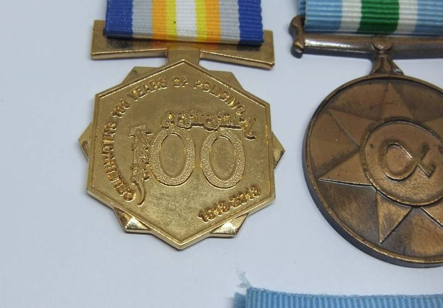 COOL FIND !! A LOT OF FOUR POLICE RELATED MEDALS WITH ORIGINAL RIBBONS IN GREAT CONDITION !!