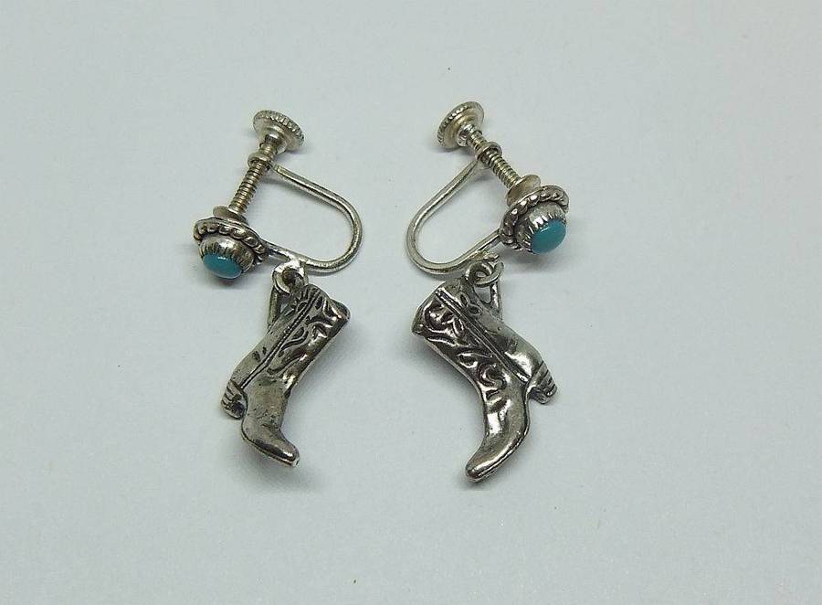 A unique pair of vintage sterling silver earrings with cabochon Turquoise and cowgirl booties
