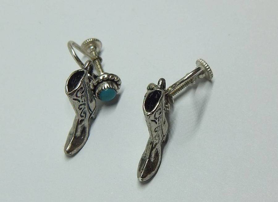A unique pair of vintage sterling silver earrings with cabochon Turquoise and cowgirl booties