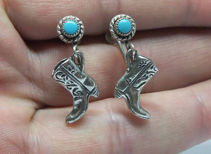A unique pair of vintage sterling silver earrings with cabochon Turquoise and cowgirl booties