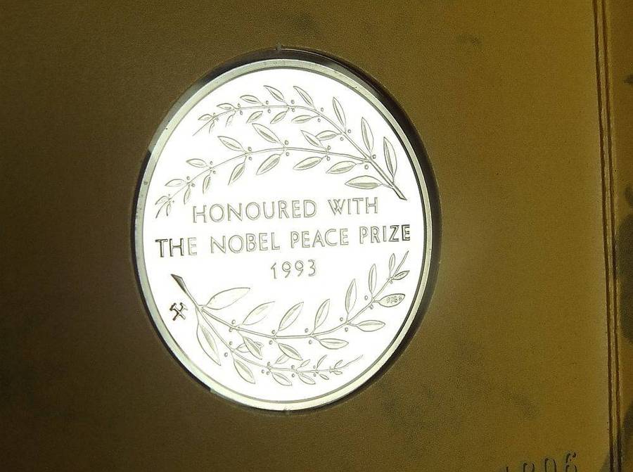 A limited edition 2001 solid sterling silver Nelson Mandela medallion by the Mint of Norway