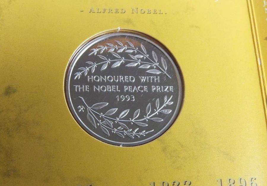 A limited edition 2001 solid sterling silver Nelson Mandela medallion by the Mint of Norway