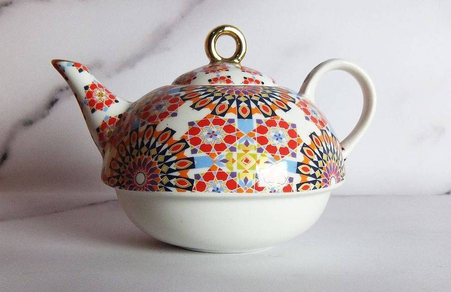 A colourful tea for one sized porcelain teapot made by Maxwell & Williams designer homeware