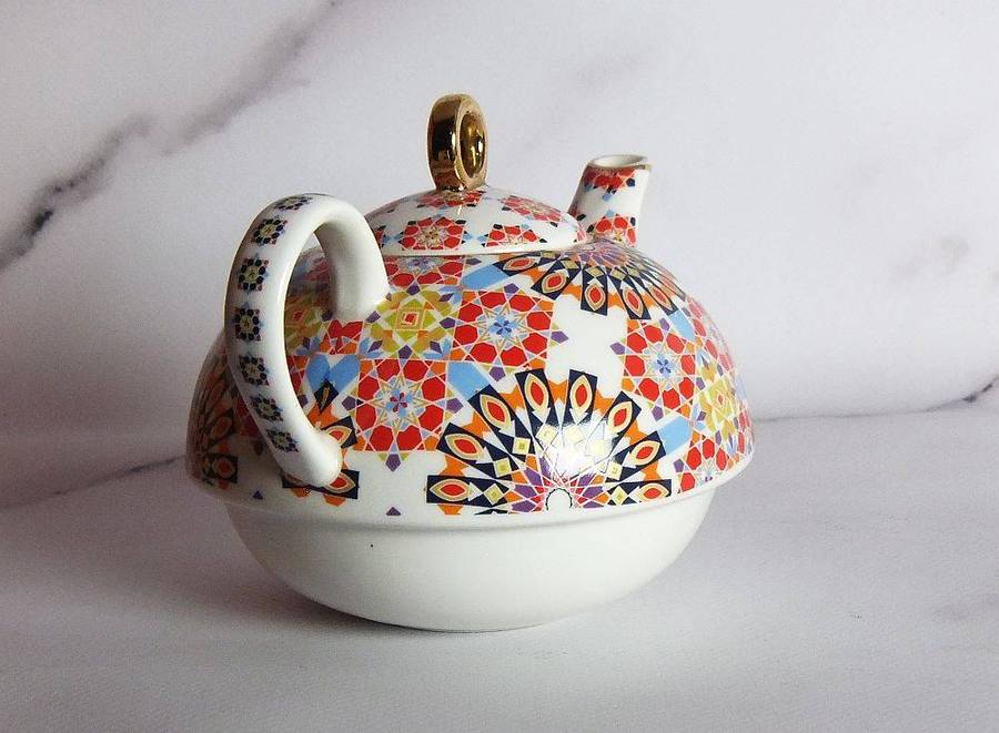 A colourful tea for one sized porcelain teapot made by Maxwell & Williams designer homeware
