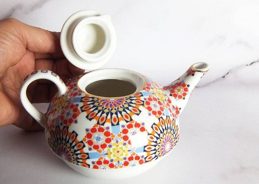 A colourful tea for one sized porcelain teapot made by Maxwell & Williams designer homeware