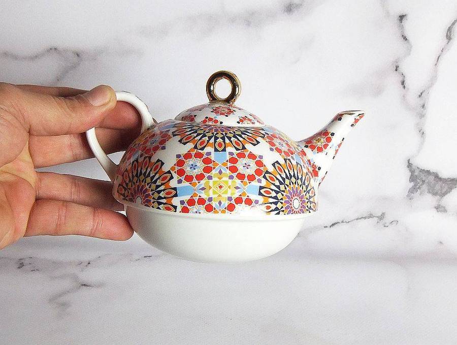 A colourful tea for one sized porcelain teapot made by Maxwell & Williams designer homeware