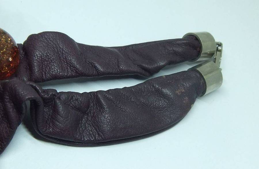 A vintage leather , acrylic bead and metal necklace by modernist Italian designer Wilma Spagli