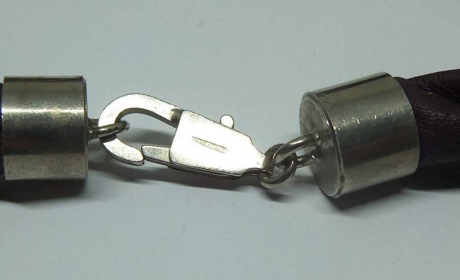 A vintage leather , acrylic bead and metal necklace by modernist Italian designer Wilma Spagli