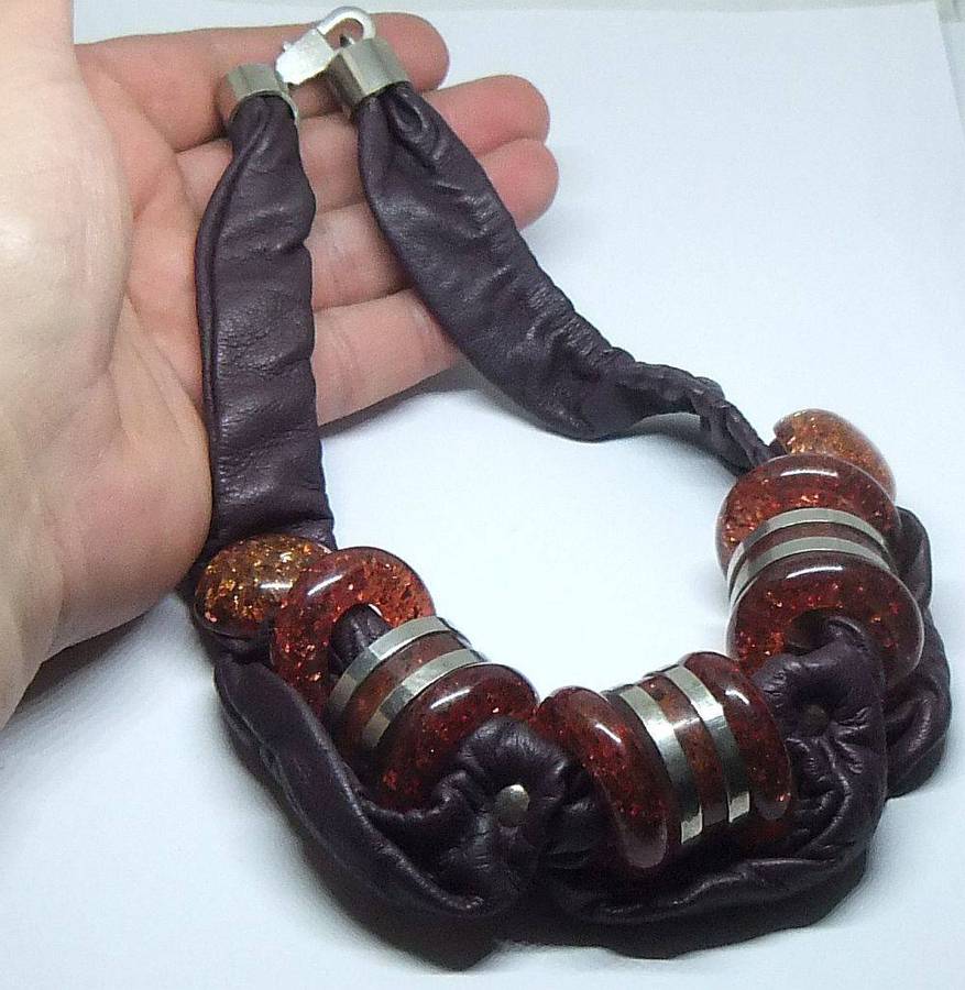 A vintage leather , acrylic bead and metal necklace by modernist Italian designer Wilma Spagli