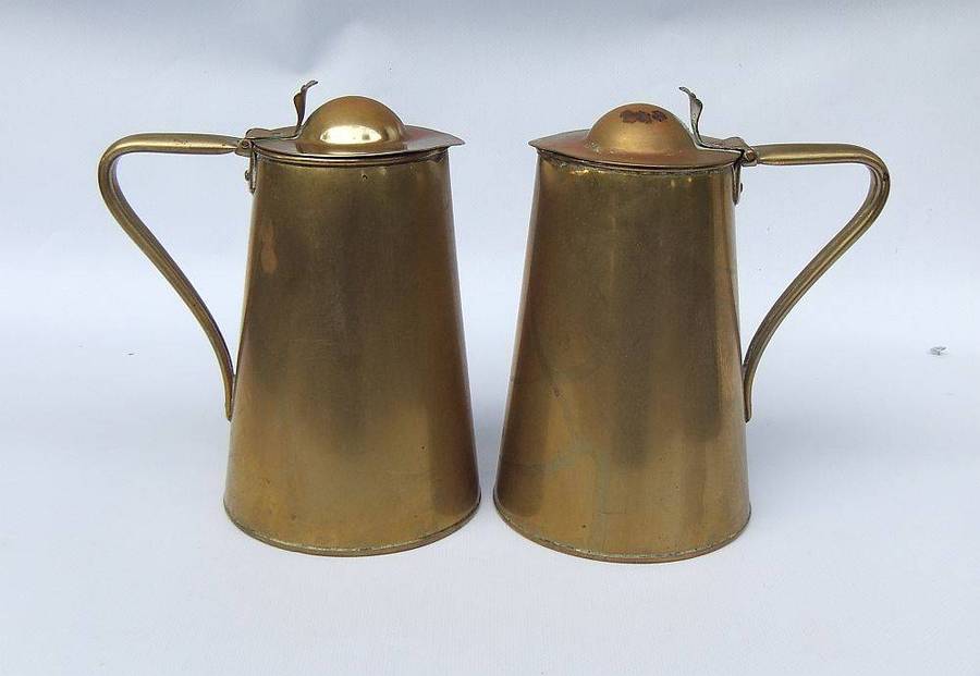 A rare pair of Art Nouveau era brass water jugs by Joseph Sankey & Sons with hinged lids