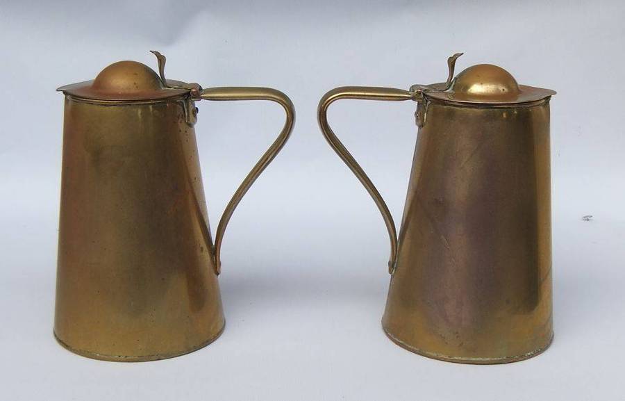 A rare pair of Art Nouveau era brass water jugs by Joseph Sankey & Sons with hinged lids