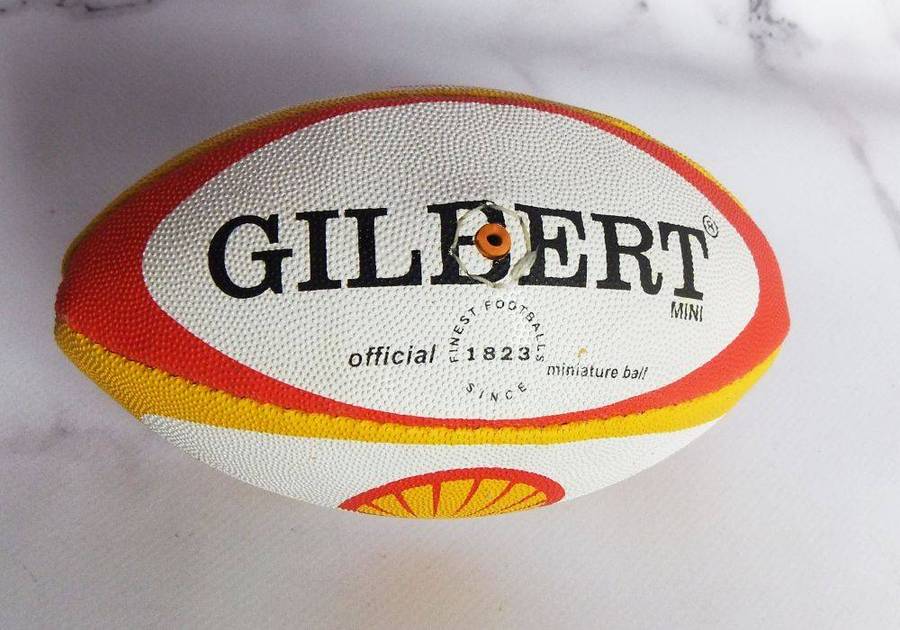Two vintage miniature rugby balls made for the Vodacom Super 12 advertising Shell oil or fuel