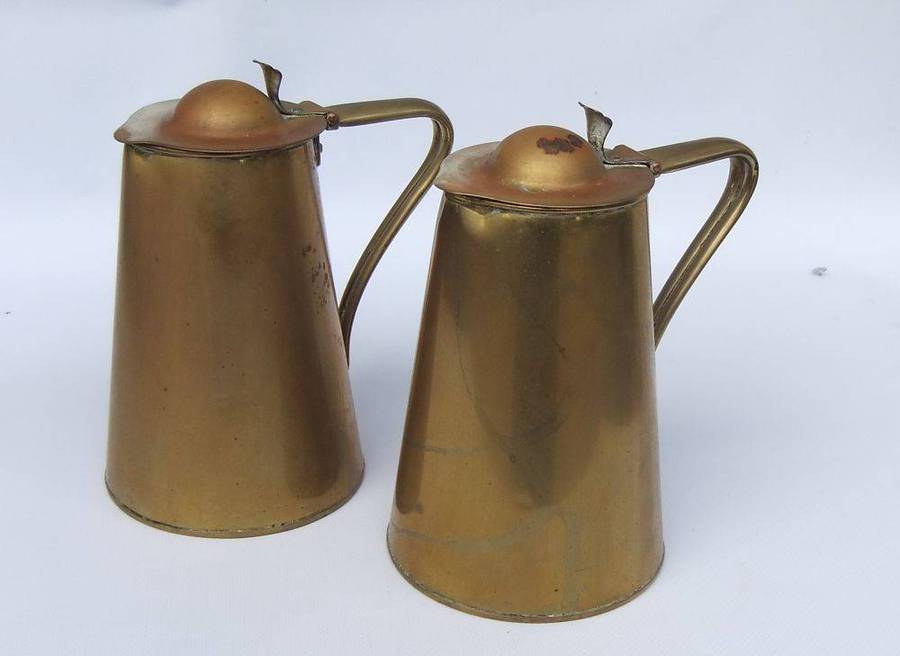A rare pair of Art Nouveau era brass water jugs by Joseph Sankey & Sons with hinged lids