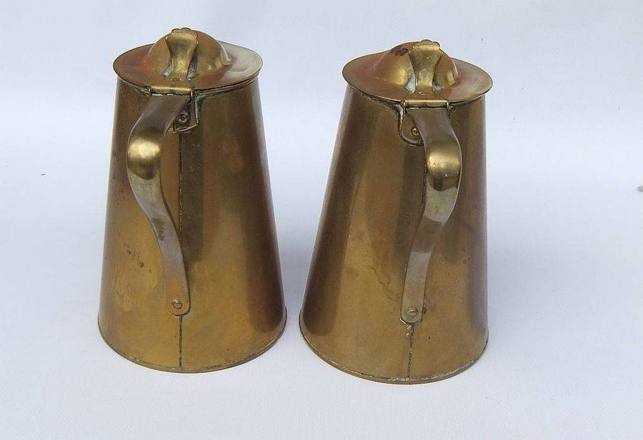A rare pair of Art Nouveau era brass water jugs by Joseph Sankey & Sons with hinged lids